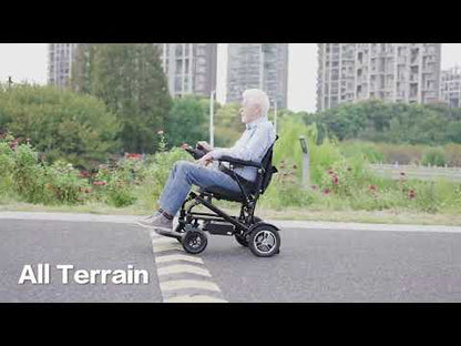 An elderly man driving a motorized wheelchair outdoors.